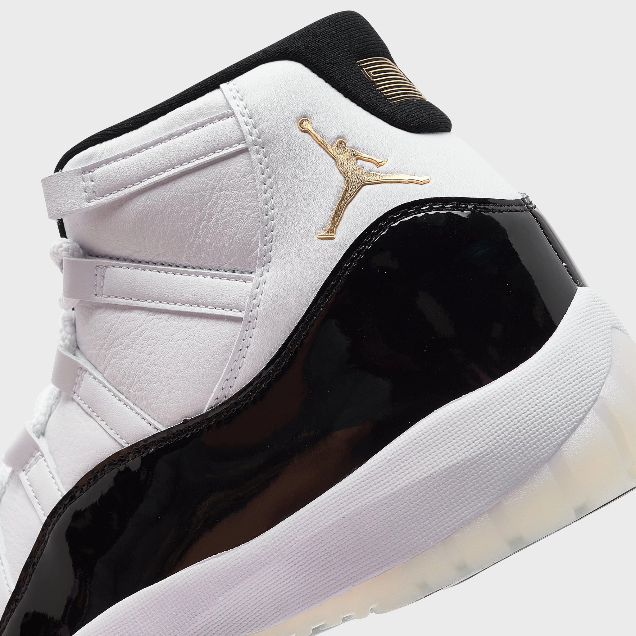 Jordan 11 Retro White / Metallic Gold - Black